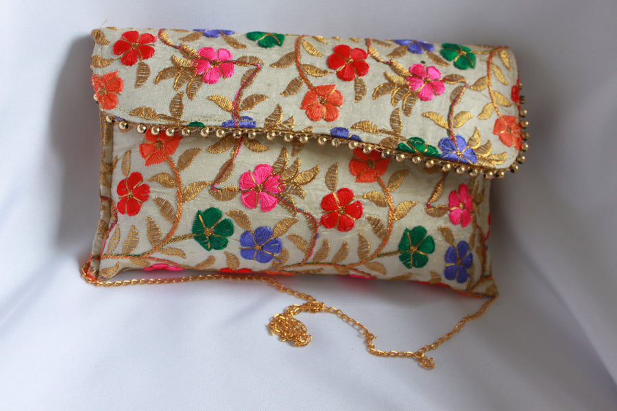 Thread embroidered clutch